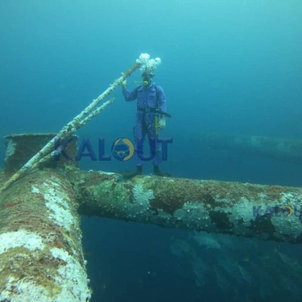 Industrial diver using advanced safety equipment